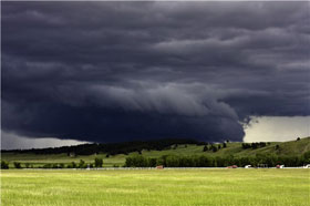 That long, black cloud is coming down